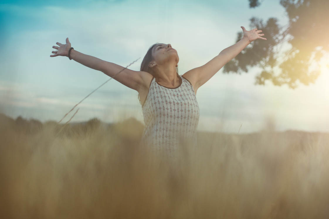 Woman free and relaxed in nature